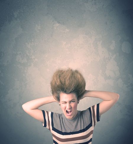 Extreme hair style young woman portrait on vintage background