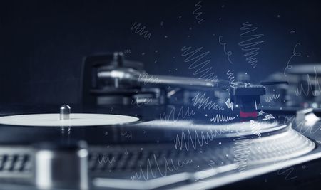 Turntable playing music with hand drawn cross lines concept on background