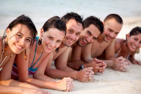 Group of people at the beach lined up