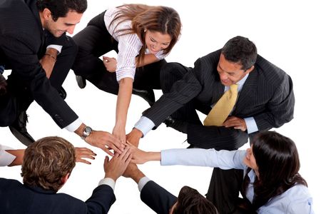 Business team with hands in the middle isolated