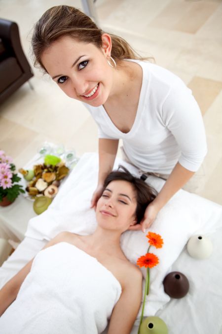 Beauty and spa girl giving a massage