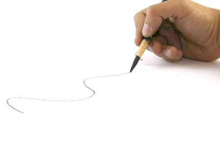 hand drawing a line with a charcoal pen
