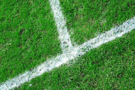 Picture of a football field focused on the touchline