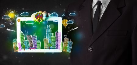 Young person showing tablet with hand drawn colorful cityscape