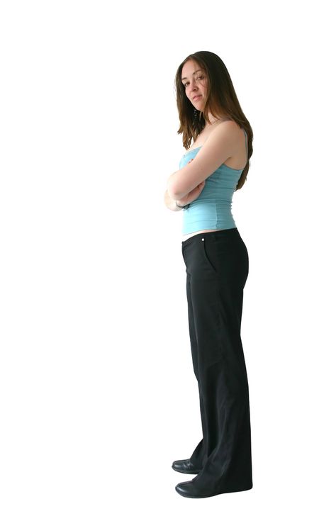 business woman with crossed arms looking sideways