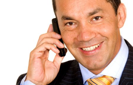 Business man on the phone in an office over a white background