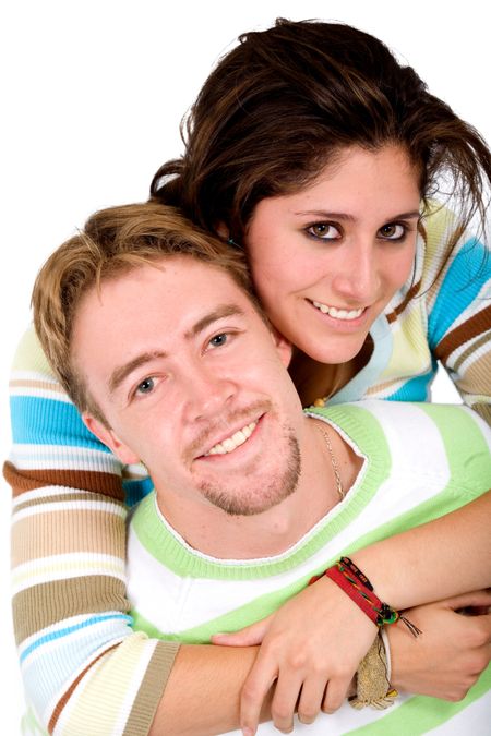 Beautiful couple smiling as they are having fun - isolated over a white background