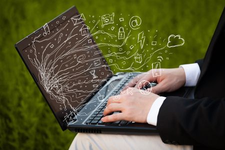 Man pressing notebook laptop computer with doodle icon media cloud symbols 