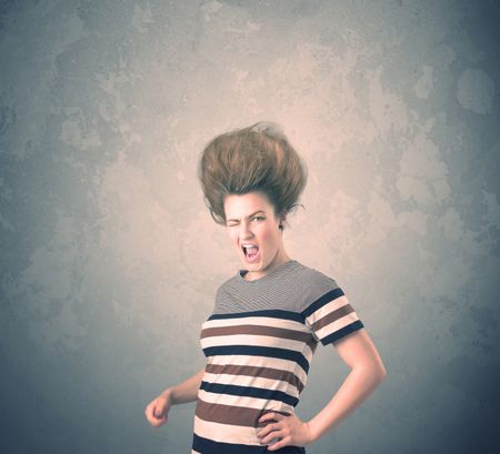 Extreme hair style young woman portrait on vintage background