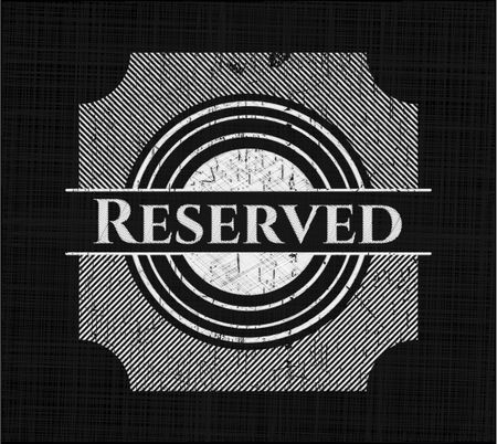 Reserved chalkboard emblem on black board