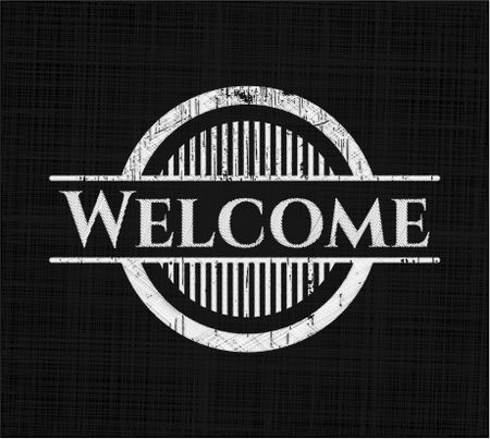 Welcome chalkboard emblem written on a blackboard