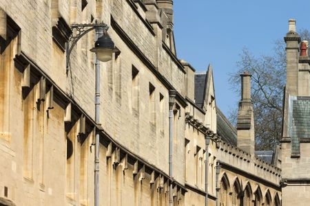 curved-street-made-cotswold-stone-tall-346769099 Curved street made from Cotswold stone with tall chimney stacks