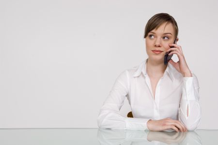 Businesswoman talking on a cell phone.