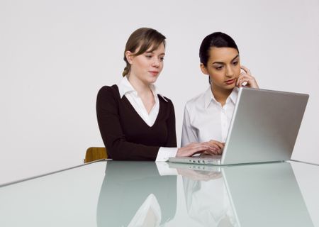 Businesswomen working on Laptop.