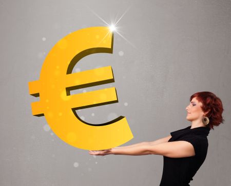 Beautiful young girl holding a big 3d gold euro sign