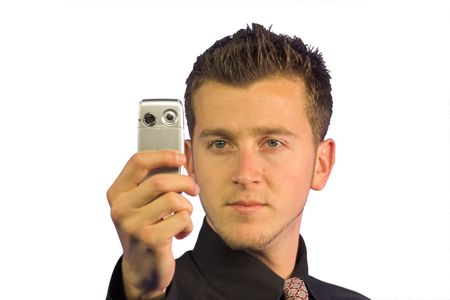 business man taking a photo of himself with his camera phone