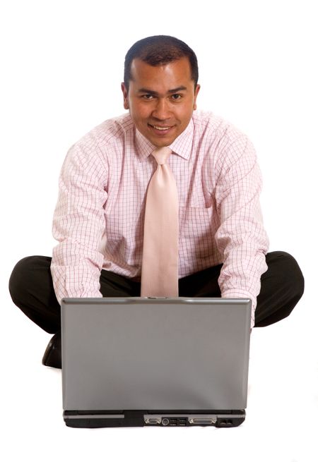 business man working on a  laptop computer - isolated over white