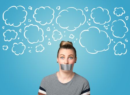 Funny person with taped mouth and hand drawn clouds around head