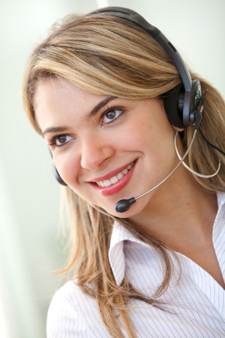 Female Customer service representative smiling in an office