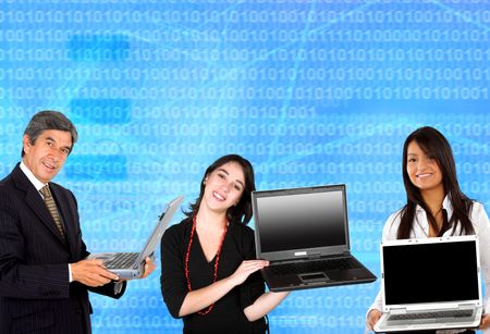 business people holding laptop computers over a blue background