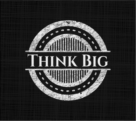 Think Big chalk emblem written on a blackboard