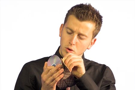 business man cleaning a CD