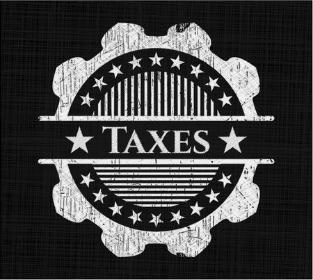 Taxes written with chalkboard texture