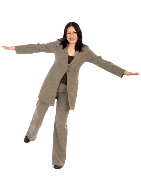 Business woman balancing and smiling over a white background