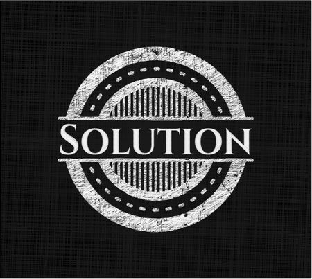 Solution chalkboard emblem on black board