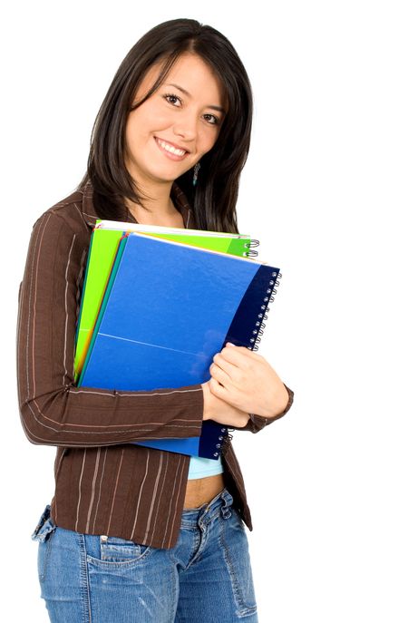 female university student smiling and carrying some notebooks - isolated over a white background