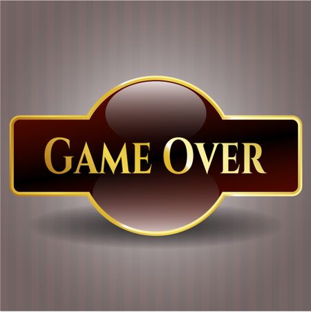 Game Over gold emblem or badge