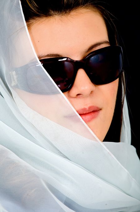 fashion woman portrait where she is wearing sunglasses