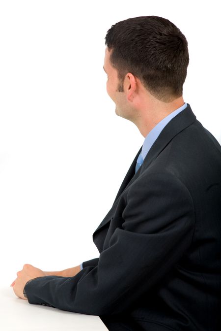 business man facing the background looking at something you can put on the photo - isolated over a white background