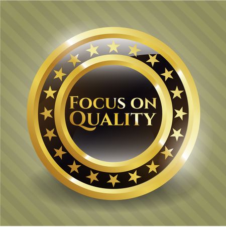 Focus on Quality gold emblem or badge