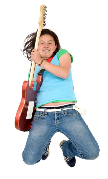 girl playing an electric guitar while jumping in the air