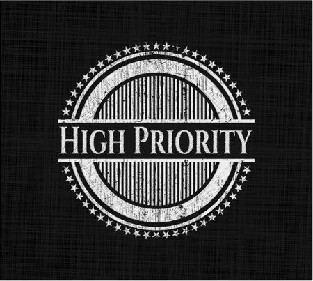 High Priority chalkboard emblem on black board