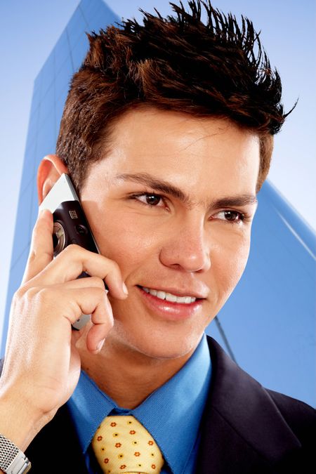 Business man talking on his mobile phone