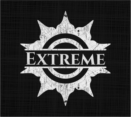 Extreme chalkboard emblem on black board