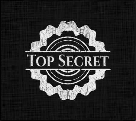 Top Secret chalkboard emblem on black board