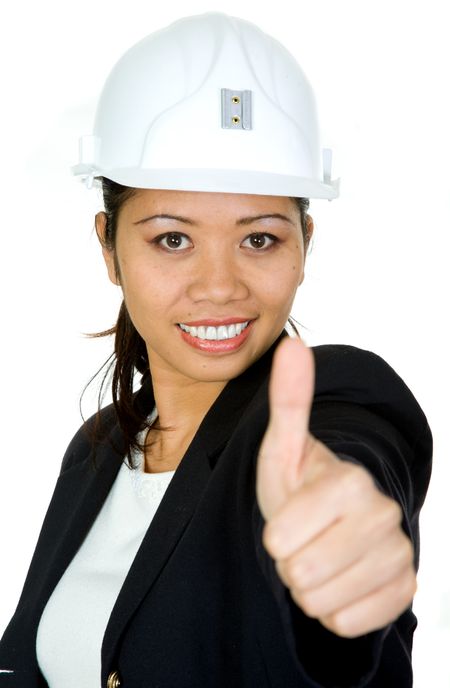asian female architect with her thumbs up - isolated over white background with the focus on her eyes