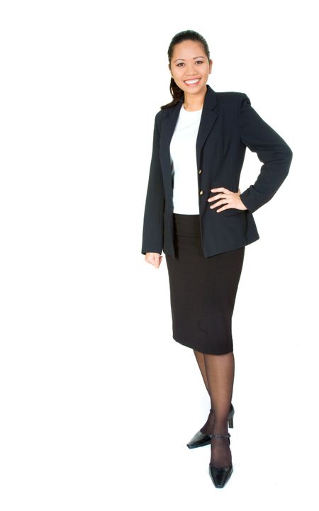 confident business woman standing wearing elegant clothes including a black skirt and top - isolated over a white background
