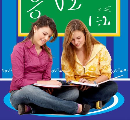 Beautiful teenage students doing their math homework