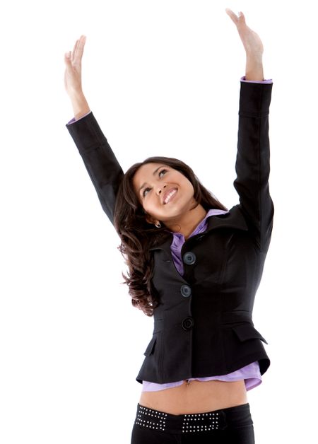 Successful business woman with arms up isolated
