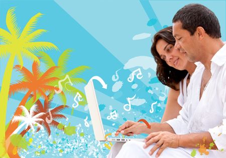 Couple at the beach listening to music on a laptop computer