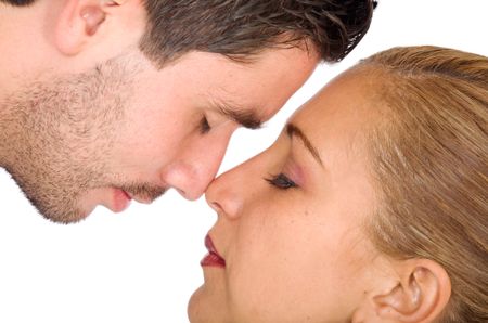 couple in love face to face - isolated over a white background