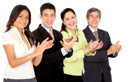 business team smiling and applauding while facing the camera over a white background