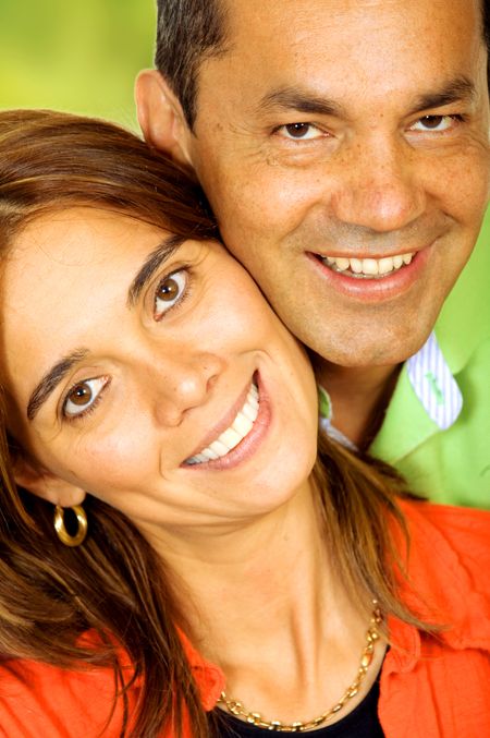 happy couple of lovers portrait both smiling