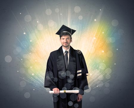 happy-graduate-colorful-bokeg-lights-background-363167957 Happy graduate with colorful bokeg lights in the background grunge wall