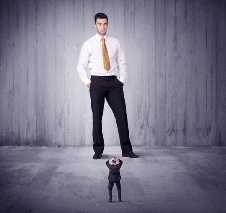 Huge boss manager lokking at small business man concept on background