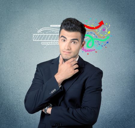 A handsome sales person standing in front of a blue  urban concrete wall with illustration expressing creativity by transforming white lines to colorful arrows cocncept